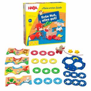 HABA Meine ersten Spiele  Ente Hut, alles gut!, Zuordnungsspiel, Inhalt: 1 Ente Lu (kleine Nachziehente aus, Holz), 5 Spielpläne (4 Spielpläne Kuschelecken und 1, Sternenteppich), 2 Holzsterne, 18 Musterplättchen (12, Hutmuster und 6 Sternenmuster), 1 Spi